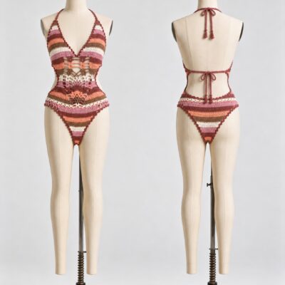 Front and back of an earth-tone striped crochet cutout swimsuit with halter ties and openwork waist