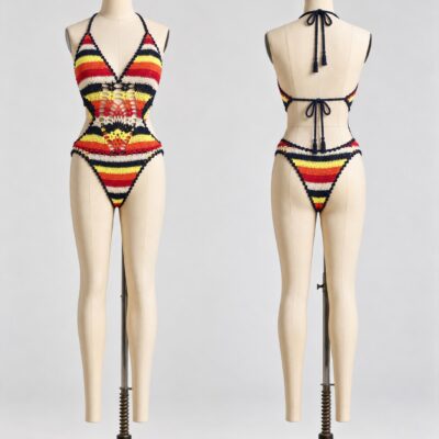 Front and back of a multicolor striped crochet cutout swimsuit with halter ties and openwork waist