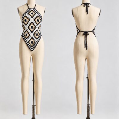 Front and back of a black and ivory granny square crochet halter top with tan accents, pointed hem and neck and back ties